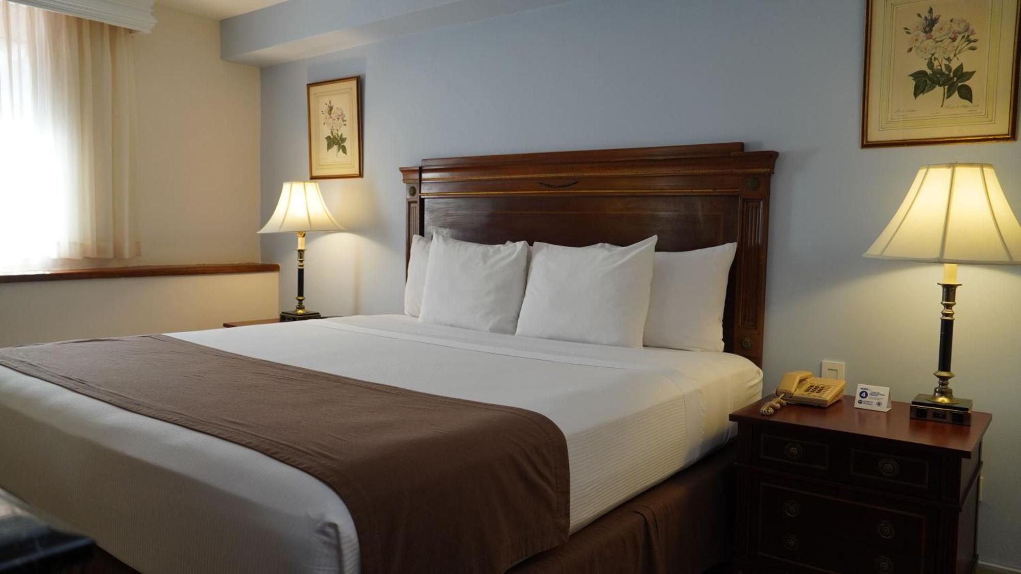 Hotel El Prado 바랑키야 외부 사진 A bed